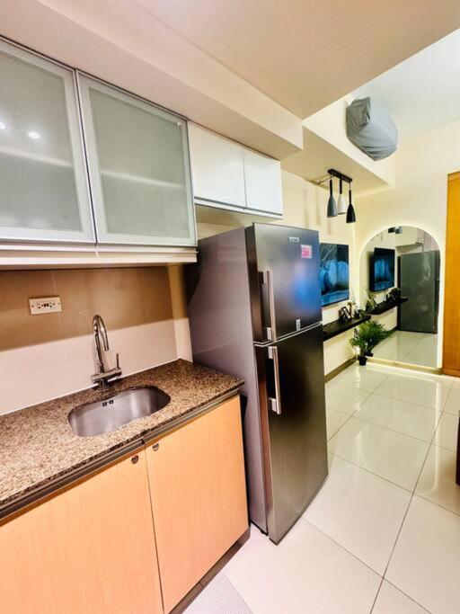 One Uptown Residences Bgc 따구익 외부 사진